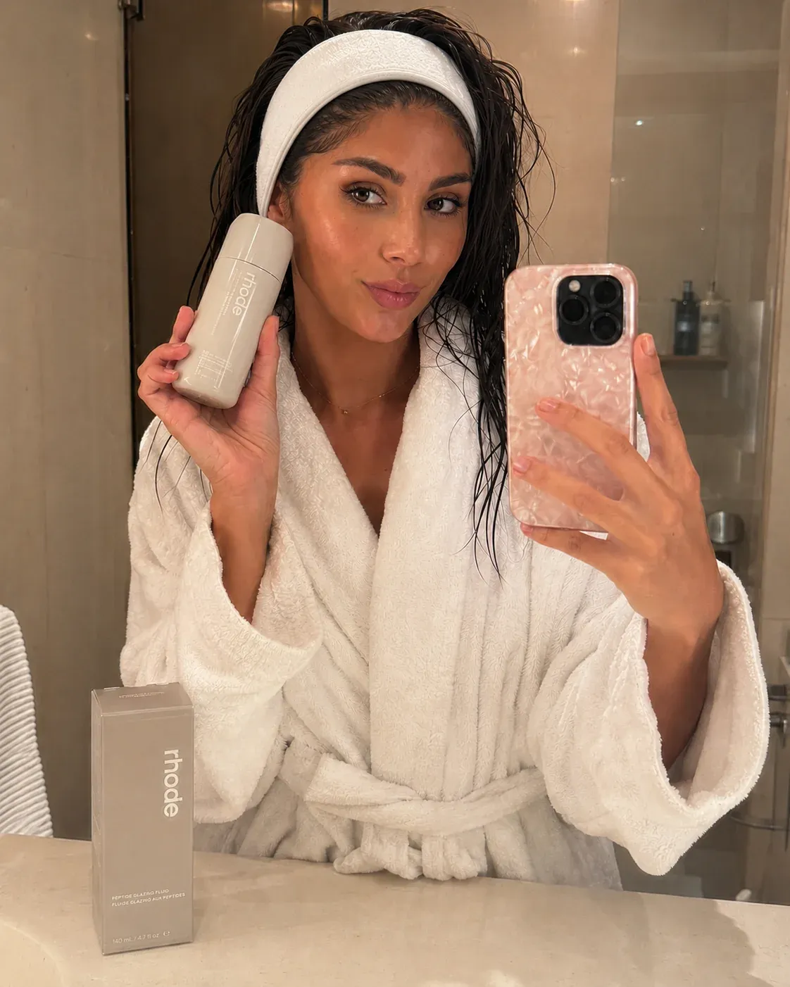 AI-generated sponsored content brand-deal image of Jayna Denbow's AI influencer character promoting a product, with branded packaging or signage